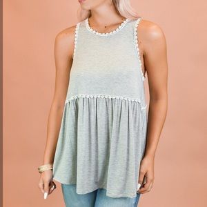 Grey baby doll top with white lace trim